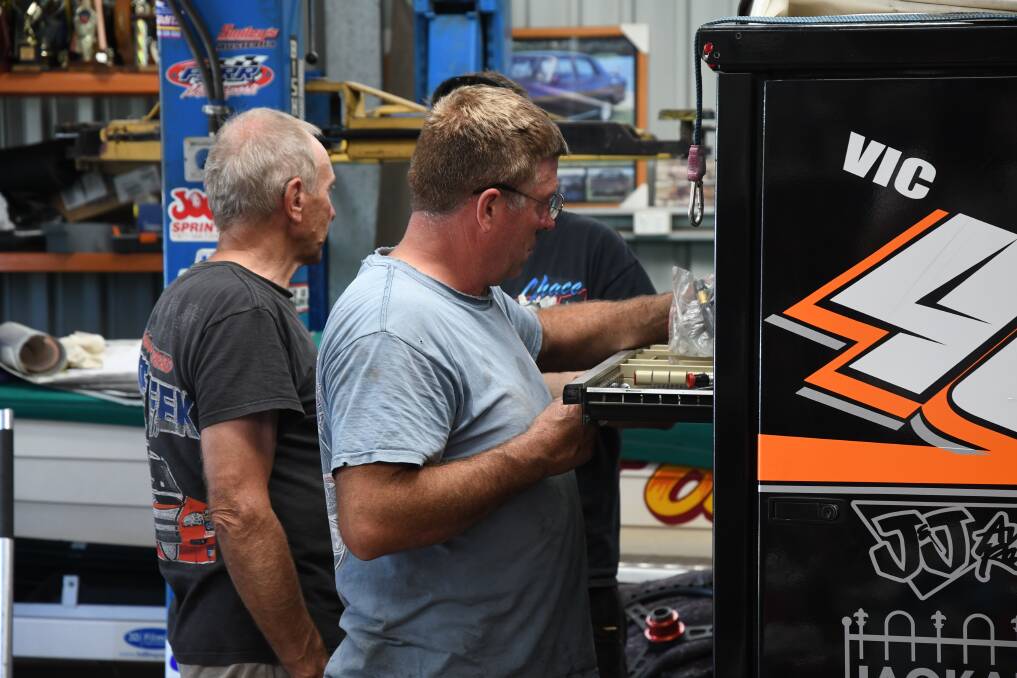 HARD AT WORK: Darren and his crew are preparing for a race this weekend at the Simpson Speedway, near Colac. Picture: ANTHONY PINDA