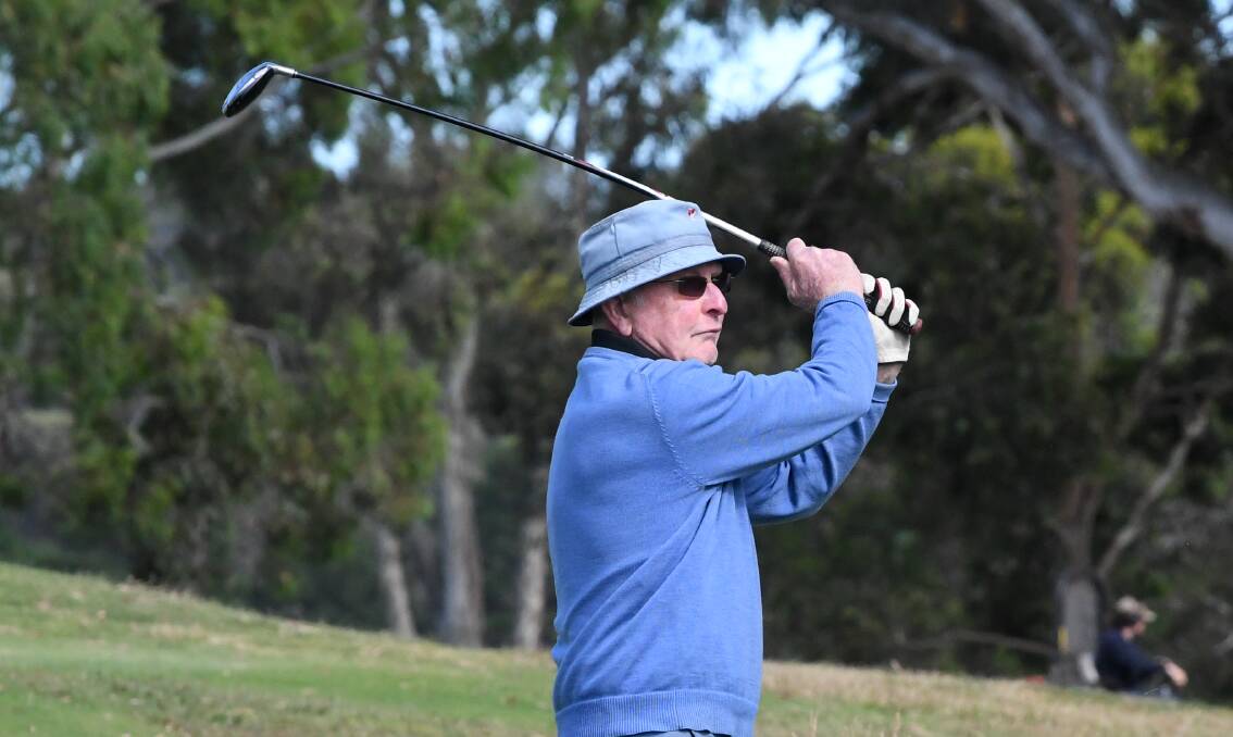 GOOD SWING: Fred Cameron takes his shot towards the par-three 10th green at Neangar Park. Picture: NONI HYETT
