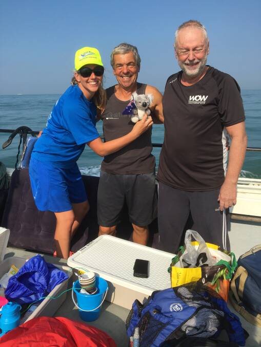 Coach and crew: Chloe McCardel (Seirer's coach) with Keith Ollier, a Channel Swimming Association observer, during Seirer's first Channel swim in 2016.