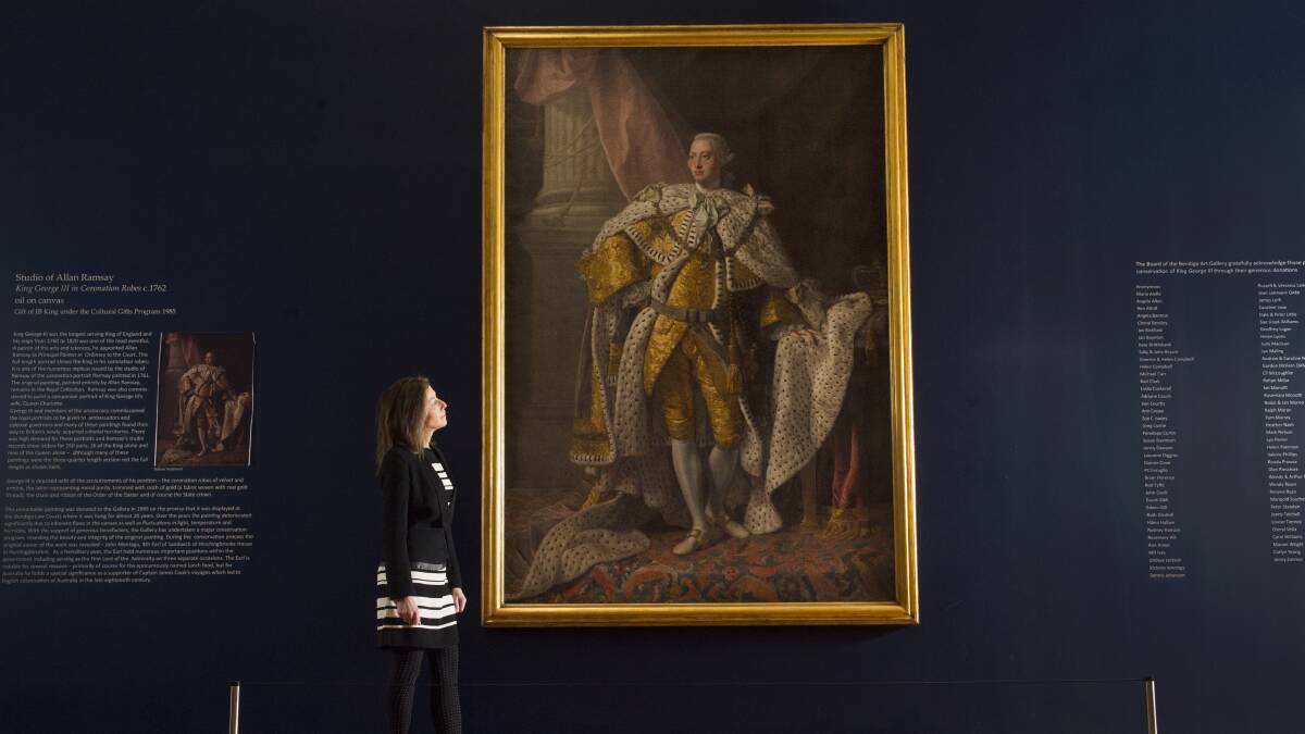 Bendigo Gallery Director Karen Quinlan with the large-scale Allan Ramsay portrait of King George III that was restored this year.