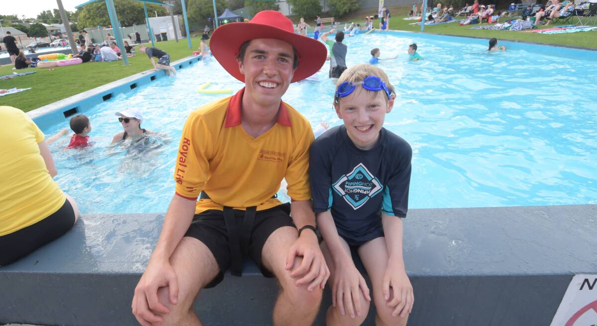 Golden Square Pool president Sam Kane with junior volunteer Henry Coaxley.