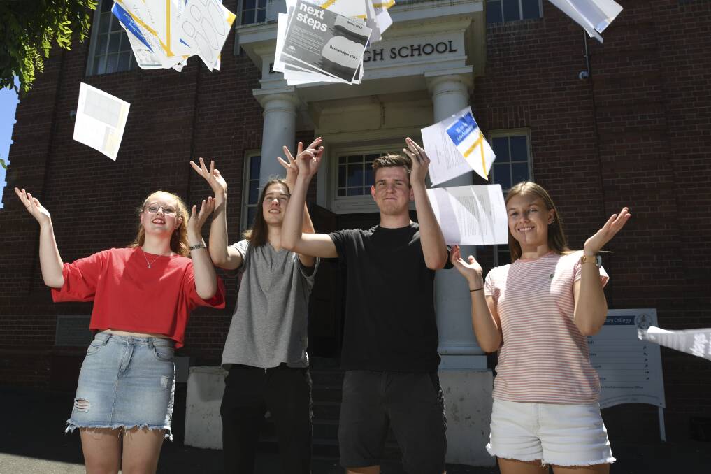 BSSC graduates Caitlin Allman, Rory Day, Joe Kenny and Kate Salvador celebrate their scores. Picture: NONI HYETT

