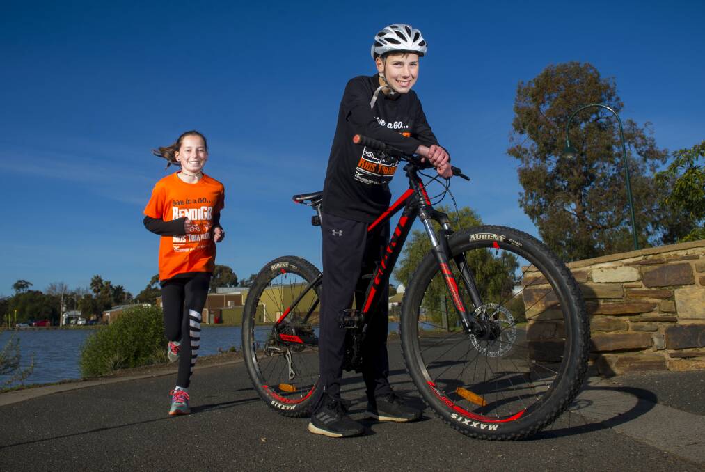 Abbey Cartner and Fraser Lee are eager to take part in the Bendigo Kids Triathlon. Picture: DARREN HOWE
