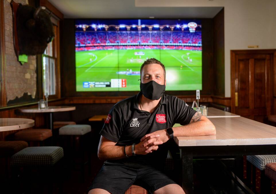 BIG SCREEN: Queen's Arms co-owner Cal Francis said pubs are a big drawcard for people who want to watch the AFL grand final. Pictures: DARREN HOWE