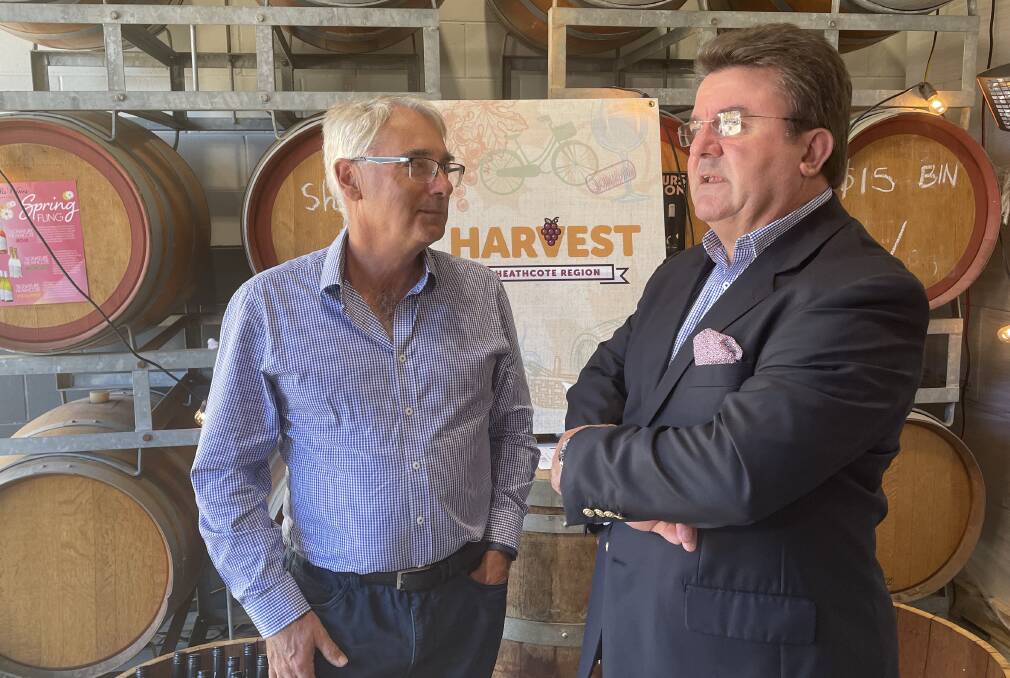 TOURISM: Heathcote Tourism and Development president Peter Young and City of Greater Bendigo major events and tourism manager Terry Karamaloudis discuss the Heathcote Harvest campaign. Picture: CHRIS PEDLER
