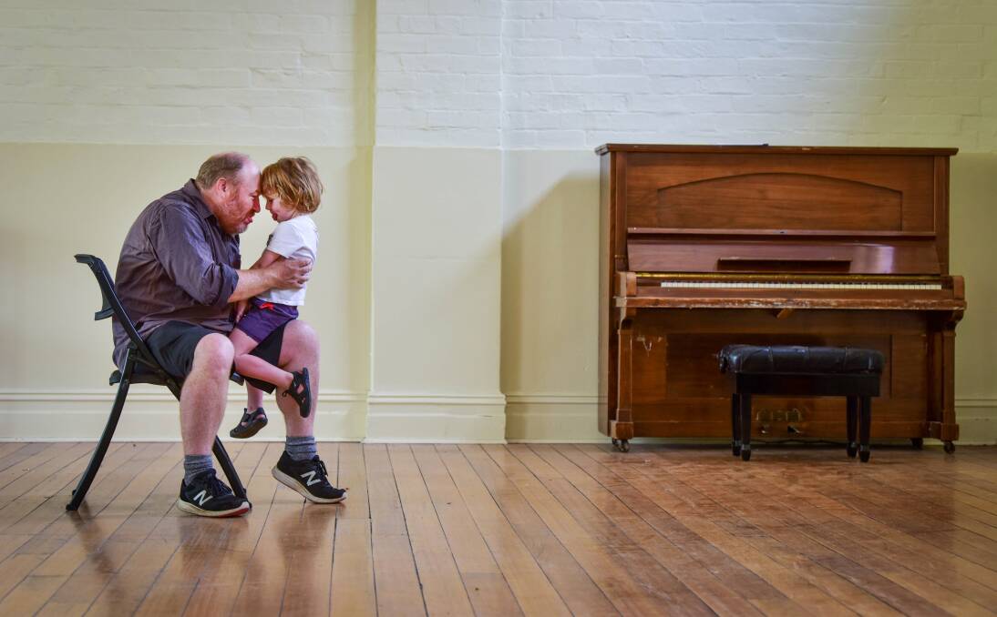 CONNECTION: Arena Theatre Company artistic director Christian Leavesley and his son Elliott. Arena's new show A Kindling Throne looks at the father-son relationship. Picture: BRENDAN MCCARTHY