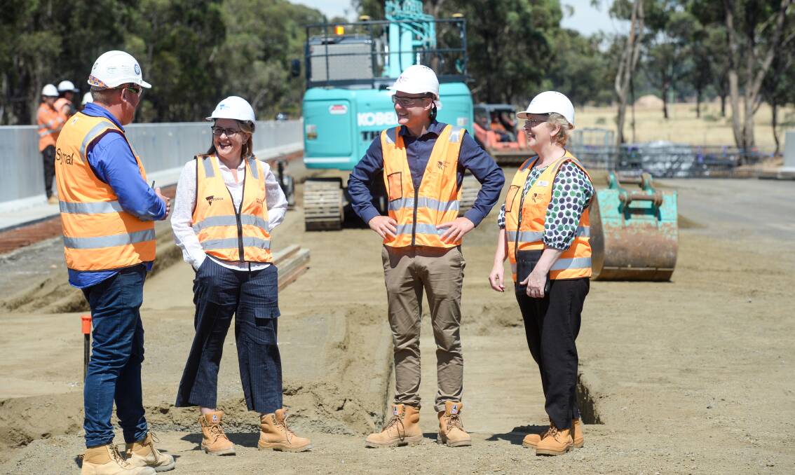 SITE: Jacinta Allan (second from left), Andrea Metcalf, Ben Henshall and David Patterson at the Huntly station site. Picture: DARREN HOWE