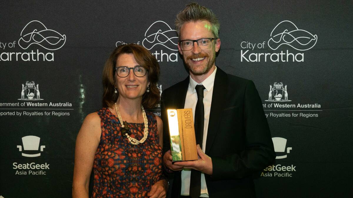 ALL SMILES: Capital Venues and Events' Stephen Henderson with PAC Australia chair Helen O’Neil at the Drover Awards. Picture: SUPPLIED