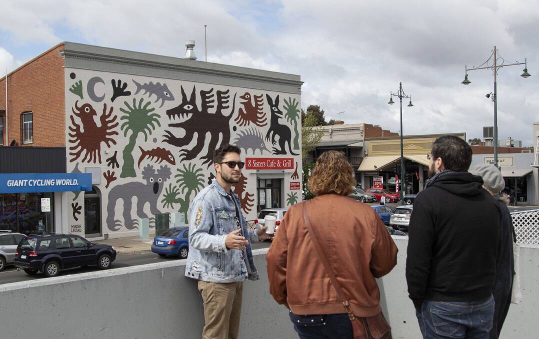 PAINTED PATHS: Reece Hendy leads people on a street art tour of Bendigo. Picture: SUPPLIED
