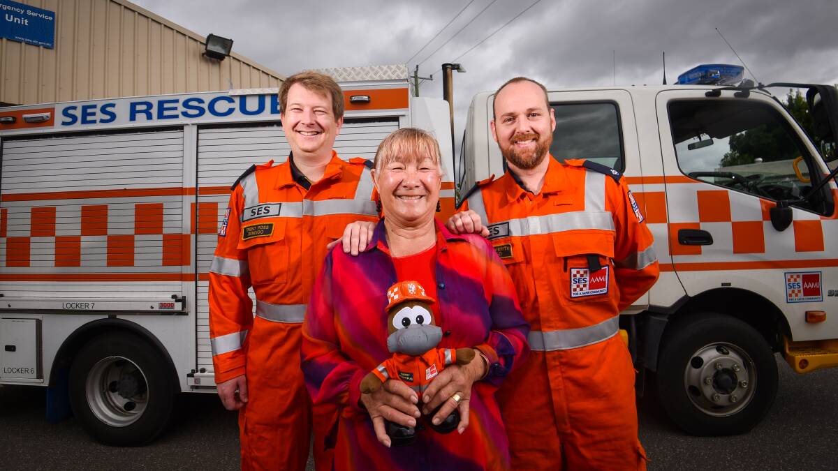 Marlene Wing-Quay with SES volunteers Trent Ross and Braden Verity who rescued her from floodwaters at Woodvale. Picture by DARREN HOWE