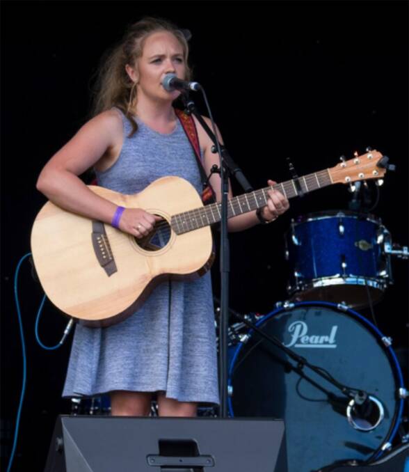 WORK AND PLAY: Young songwriter Sarah Wilkinson plays music in her spare time from studying to be a doctor. Picture: SUPPLIED