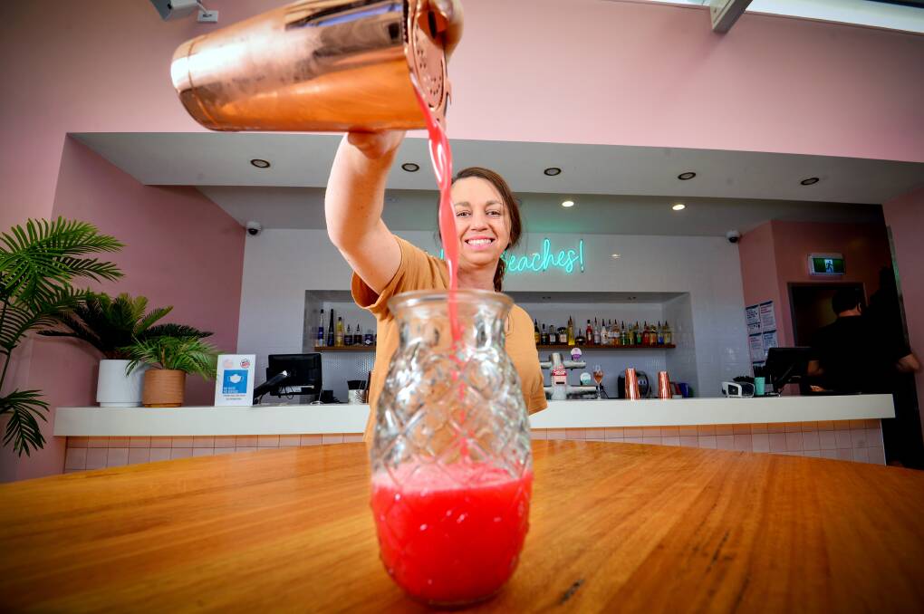 SERVICE: Amanda Ryan pours a cocktail ahead of The Foundry unveiling its new bar Miss Molly's with a Bendigo Cup event. Picture: DARREN HOWE