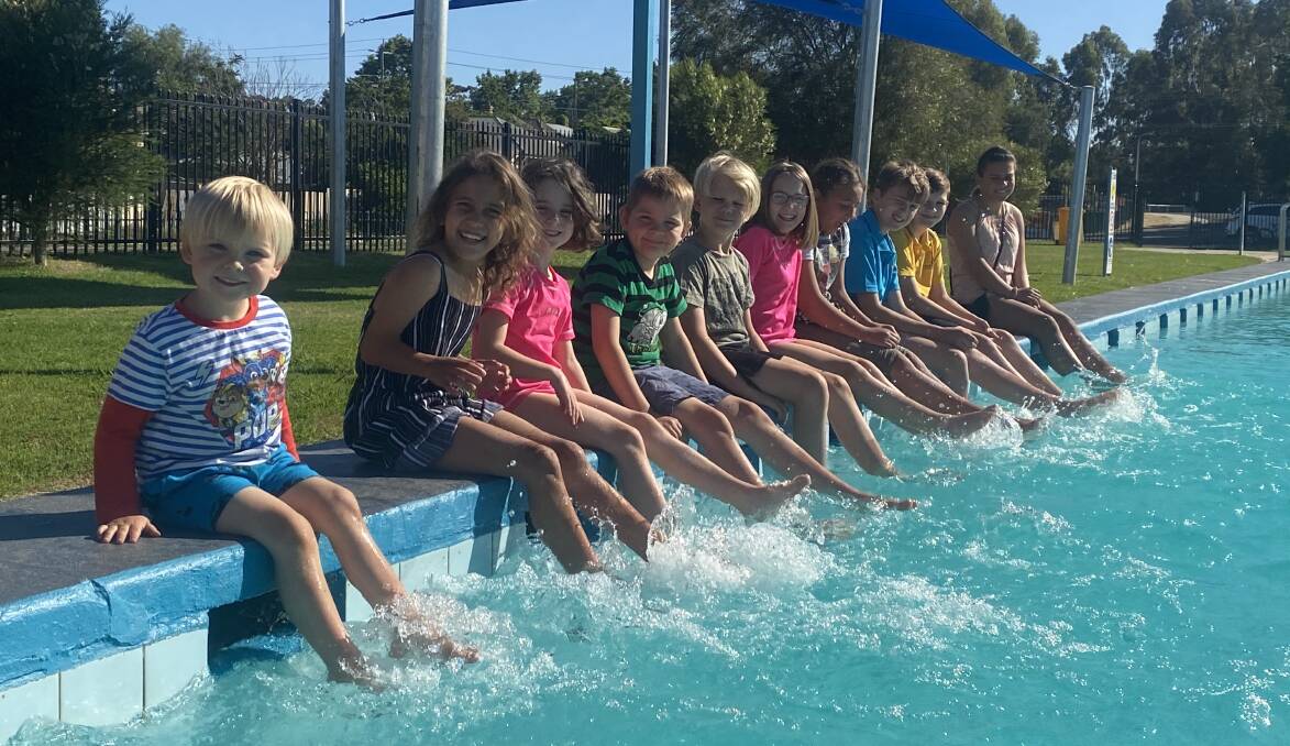 Children at the Golden Square Swimming pool get a feel for the water ahead of the pool reopening this weekend. Picture: CHRIS PEDLER