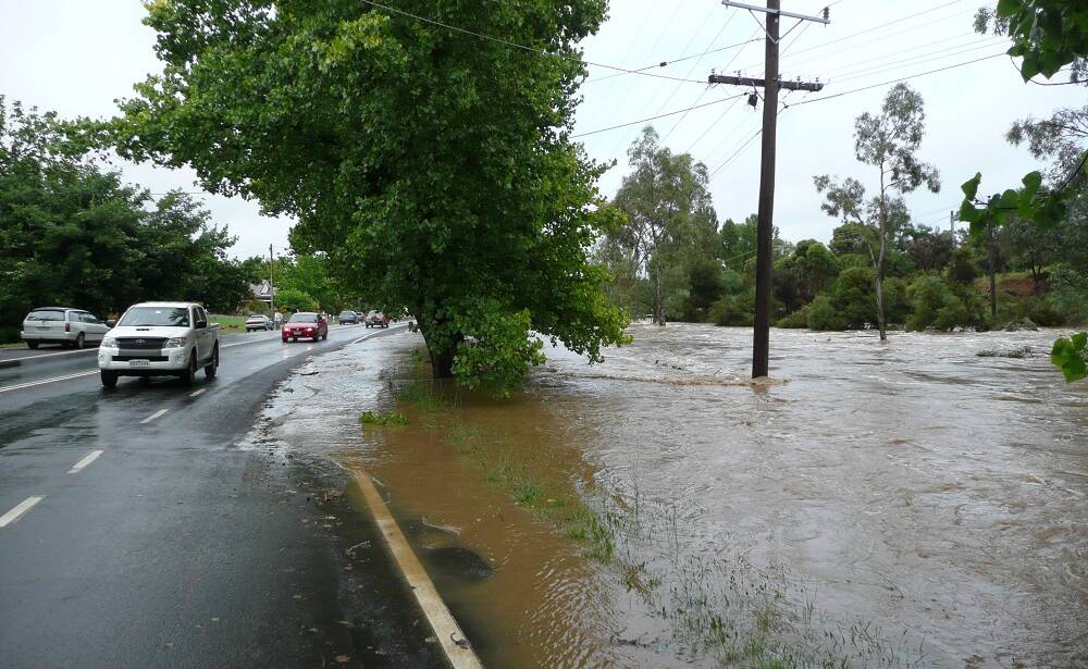 The creek alongside Johnstone Street in Castlemaine overflows in 2011. Picture: SUPPLIED