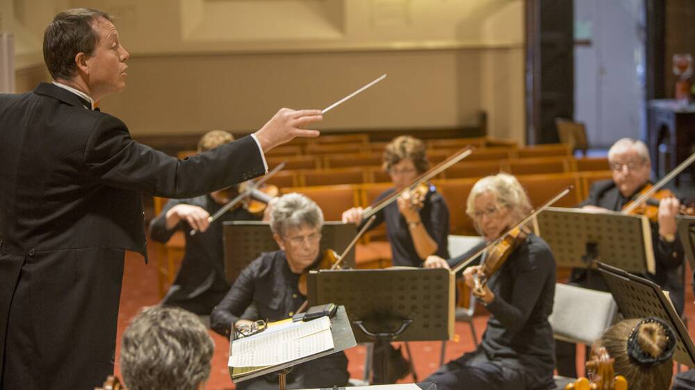 Rohan Phillips directs the Bendigo Symphony Orchestra for the final time on Sunday. Picture: Shane Carey