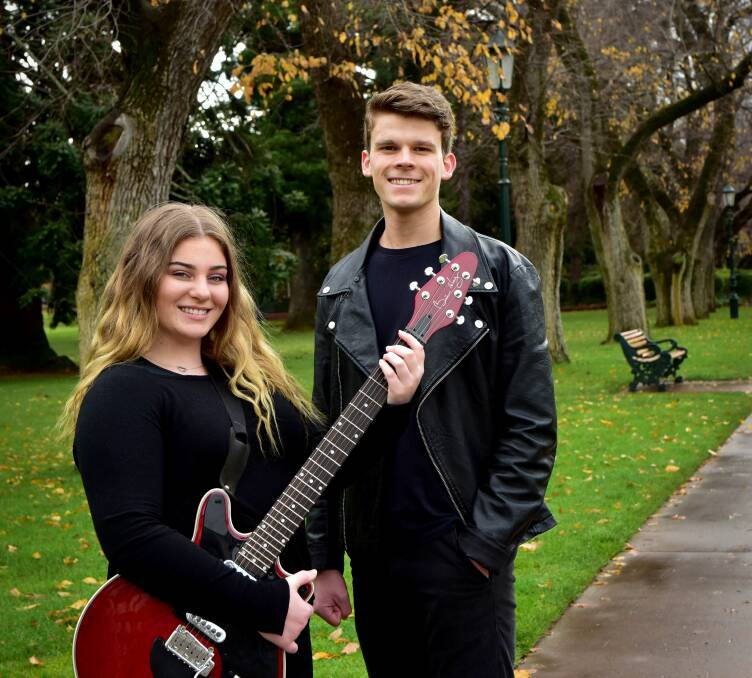 ALL SMILES: Lead performers of BTC's We Will Rock You Taylah Chisholm and Liam Brown are more than pleased with the increase in crowd sizes. Picture: BRENDAN McCARTHY