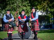 MILESTONE: Golden City Pipe Band pipe major Helen Dilks, bass drummer Phil Scott and drum major Nola Blake are excited for this year's Bendigo Easter Fair. Picture: BRENDAN McCARTHY
