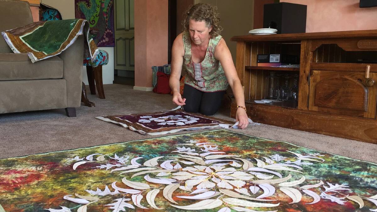 ARTWORK: Textile artist Sonya Else works on a piece for the Rochester Fine Art Exhibition's art auction. Picture: SUPPLIED