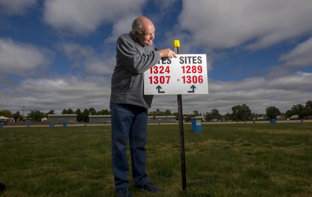 FINDING A BARGAIN: Max Diss marks out sites for this weekend's Bendigo National Swap Meet at the showgrounds. Picture: DARREN HOWE