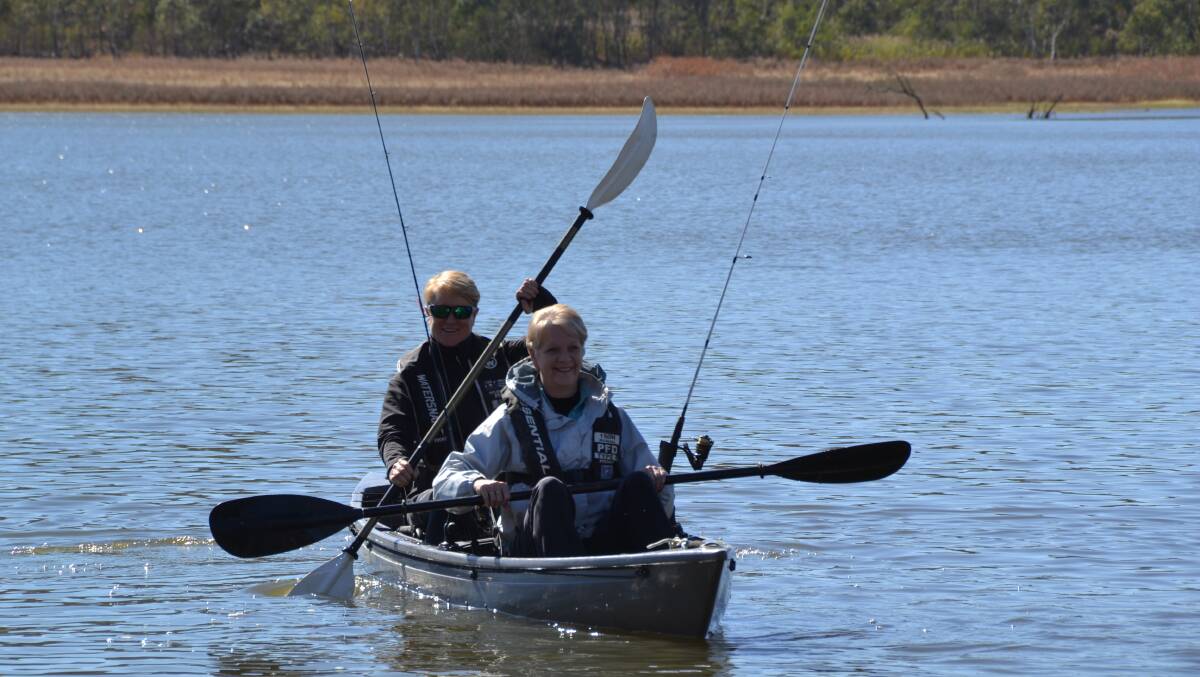 Member for Bendigo West Maree Edwards paddles across Barkers Creek Reservoir on Thursday.