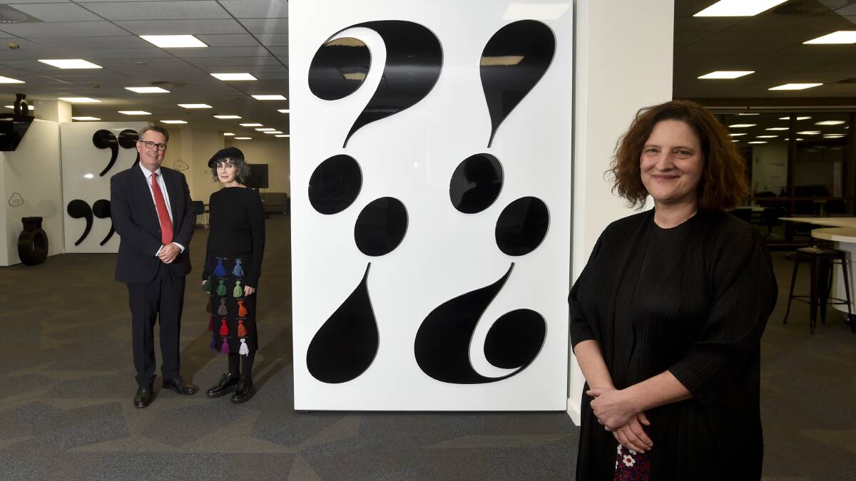 COLLECTION: A suite artworks by acclaimed Melbourne-based artist Emily Floyd (right) has been acquired by La Trobe University Bendigo. Ms Floyd with Vice-Chancellor John Dewar and Anna Schwartz. Picture: NONI HYETT