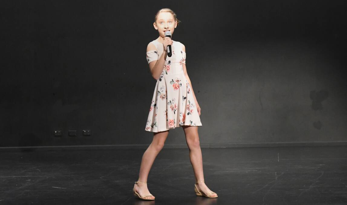 HITTING THE HIGH NOTES: Maiden Gully's Lucy Jane Hall performs at the Bendigo Competitions Society eisteddfod on Monday. The modern vocal category was held over four days. Picture: DARREN HOWE