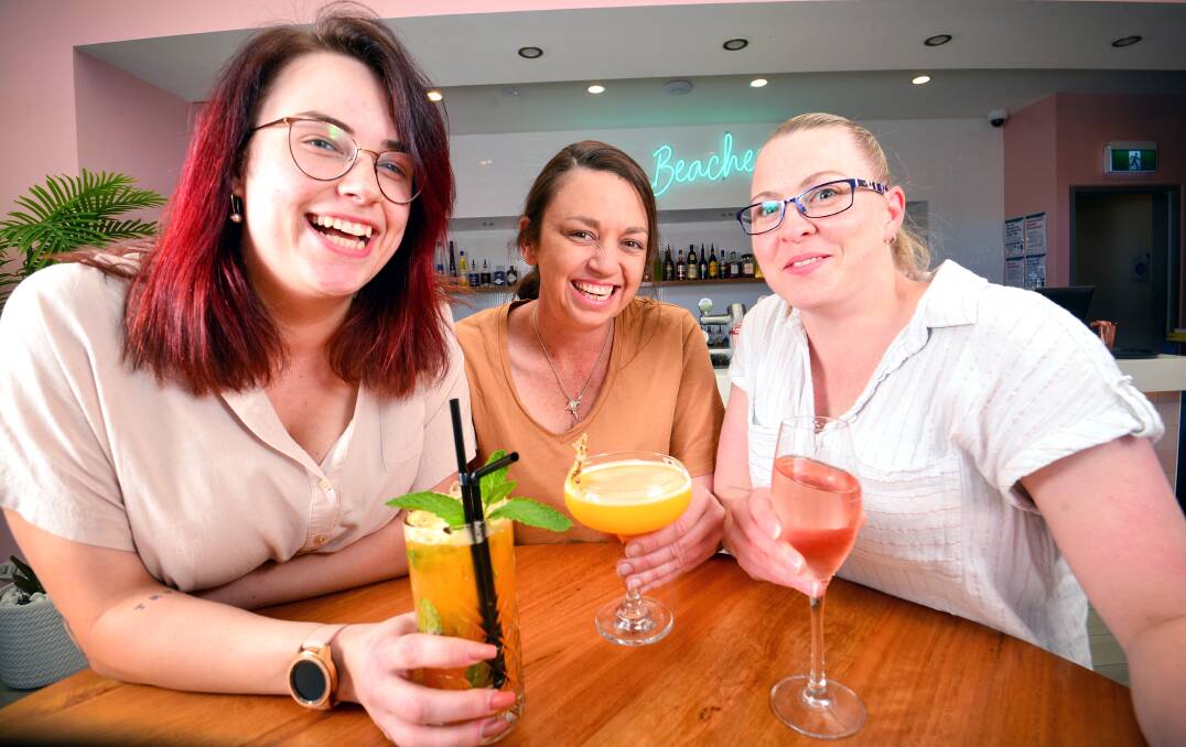 CHEERS: Nicole Hill, Amanda Ryan and Ash Sullivan are ready to enjoy cocktails and the Bendigo Cup at Miss Molly's in The Foundry. Picture: DARREN HOWE