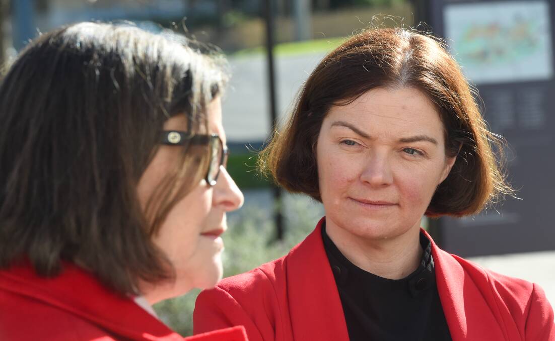 Bendigo MP Lisa Chesters looks on as assistant health minister Ged Kearney speaks to media. Picture: DARREN HOWE