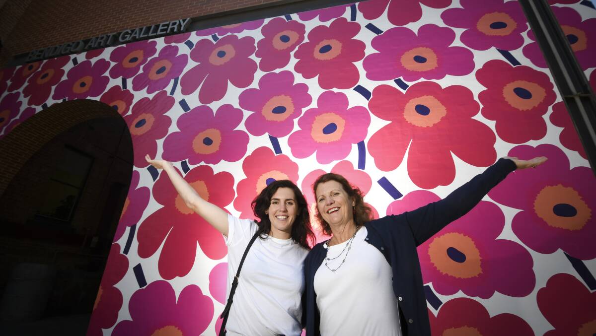 Madeline Bloedel and her mum Nicola Bloedel visit the Marimekko exhibition. Picture: NONI HYETT