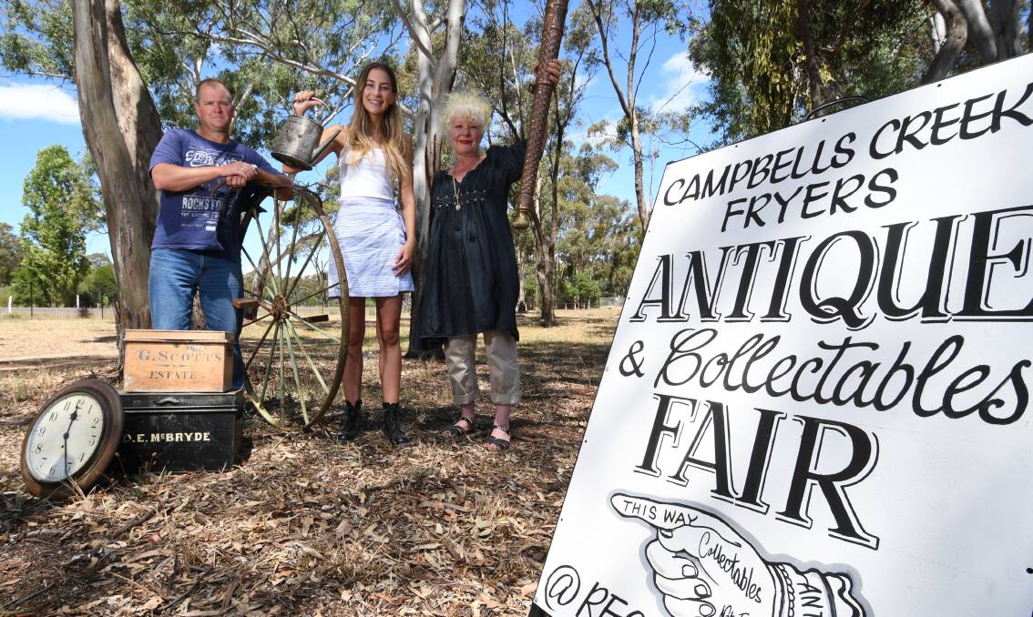 BARGAIN HUNTERS: Craig Morrow, Kim Rowlatt and Veronica Rowlatt with just a few of the many antiques and collectibles that will feature at the Campbells Creek-Fryers Antique and Collectibles Fair. Picture: NONI HYETT