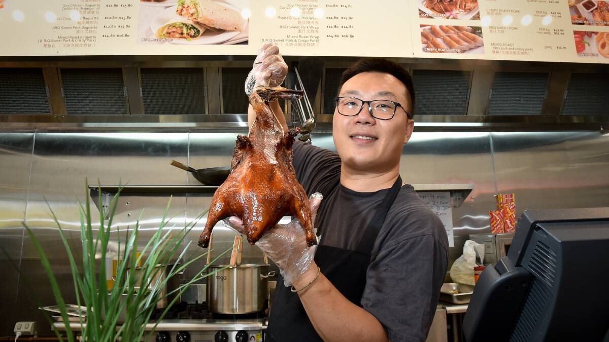 NEW VENTURE: Hongfeng Gu opened Jk's BBQ in Lyttleton Terrace this week. He has worked in restaurants in Melbourne, America France and Italy. Picture: NONI HYETT