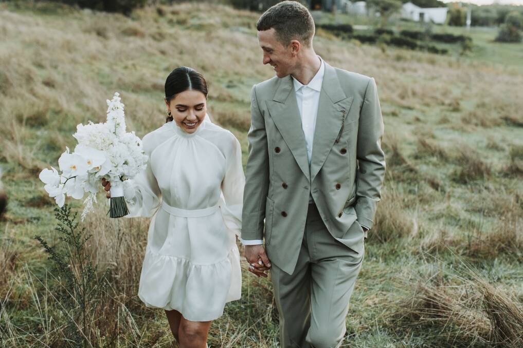 FINALLY HITCHED: Georgey Henshall and Jack Bowyer postponed their wedding date four times before finally marrying in Daylesford at the weekend. Picture: Christian and Hayley Barkla