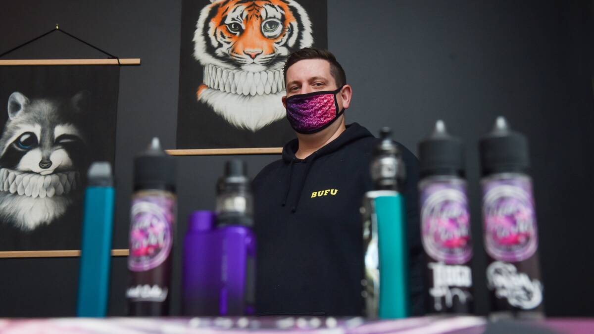 Michael Carr, who owns Juice Cartel with Hayley Wesche, believes the vaping industry needed to be better regulated to allow nicotine-based vaping products to be sold in Australia. Picture: DARREN HOWE