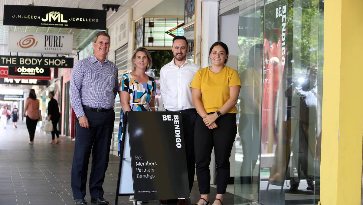 Be.Bendigo CEO Dennis Bice (left) with some of the Be.Bendigo team at their new office in Hargreaves Mall. Picture: GLENN DANIELS