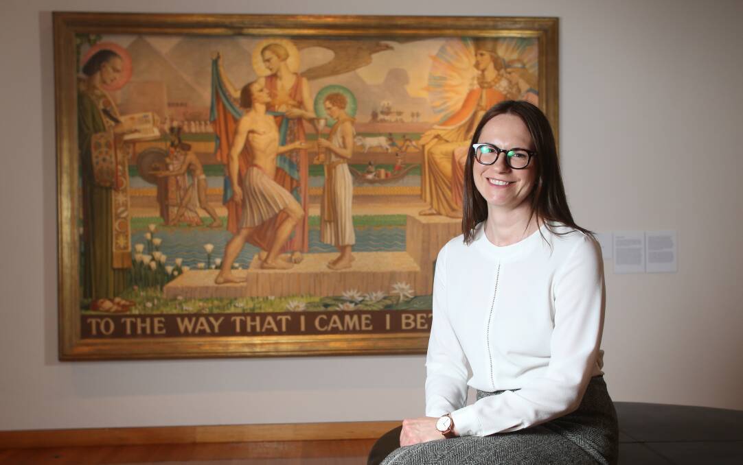 UNHERALDED: Bendigo Art Gallery curator Emma Busowski Cox with one of Christian Waller's works. Daughters of the Sun is on until February 10. Picture: GLENN DANIELS