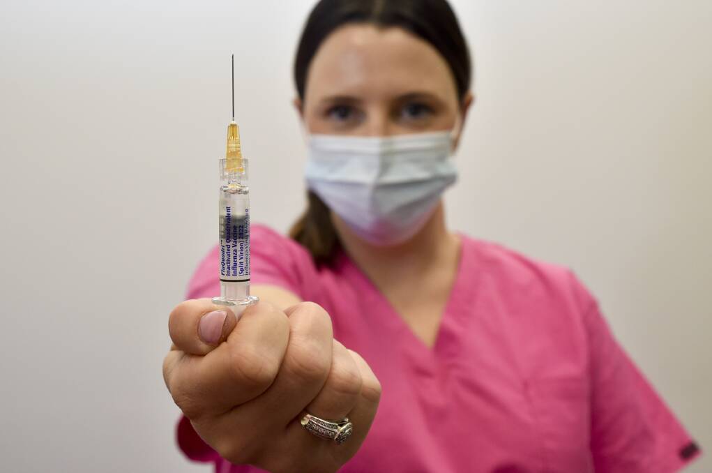 UFS Pharmacy Bendigo nurse imminiser Jacinta Prime with a flu vaccination. Picture: NONI HYETT