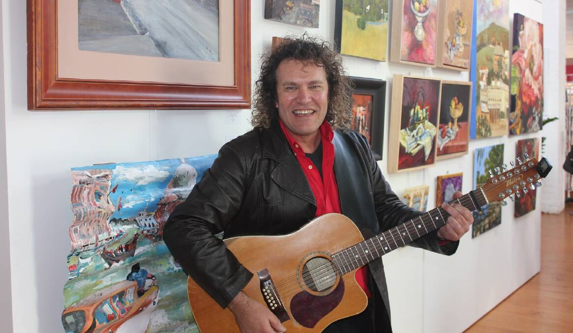 COLOURFUL: Entertainer Bill February helped launch the Market Art Winter Exhibition at the Market Building in Mostyn Street, Castlemaine. Picture: SUPPLIED