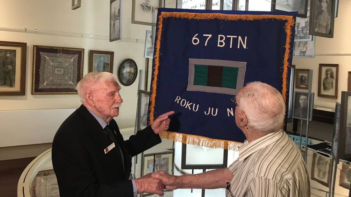 COLOURS: BCOF (Japan) Association of Australia national president Kevin Cordell (of the 67th Battalion) with national secretary Harry Fennell.