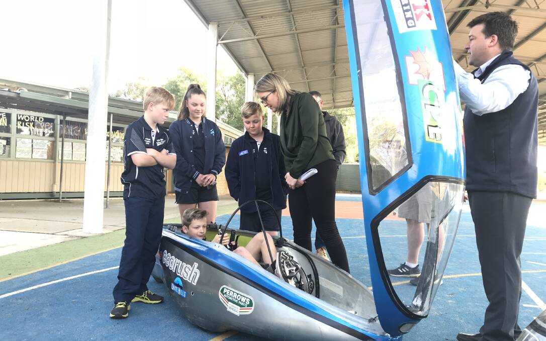 Jacinta Allan learns about human-powered vehicles from White Hills Primary School students.