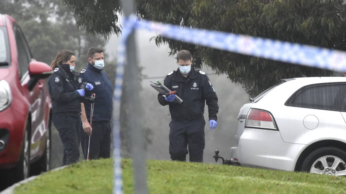 Police investigate a shooting in Neale Street, Flora Hill. Picture: NONI HYETT