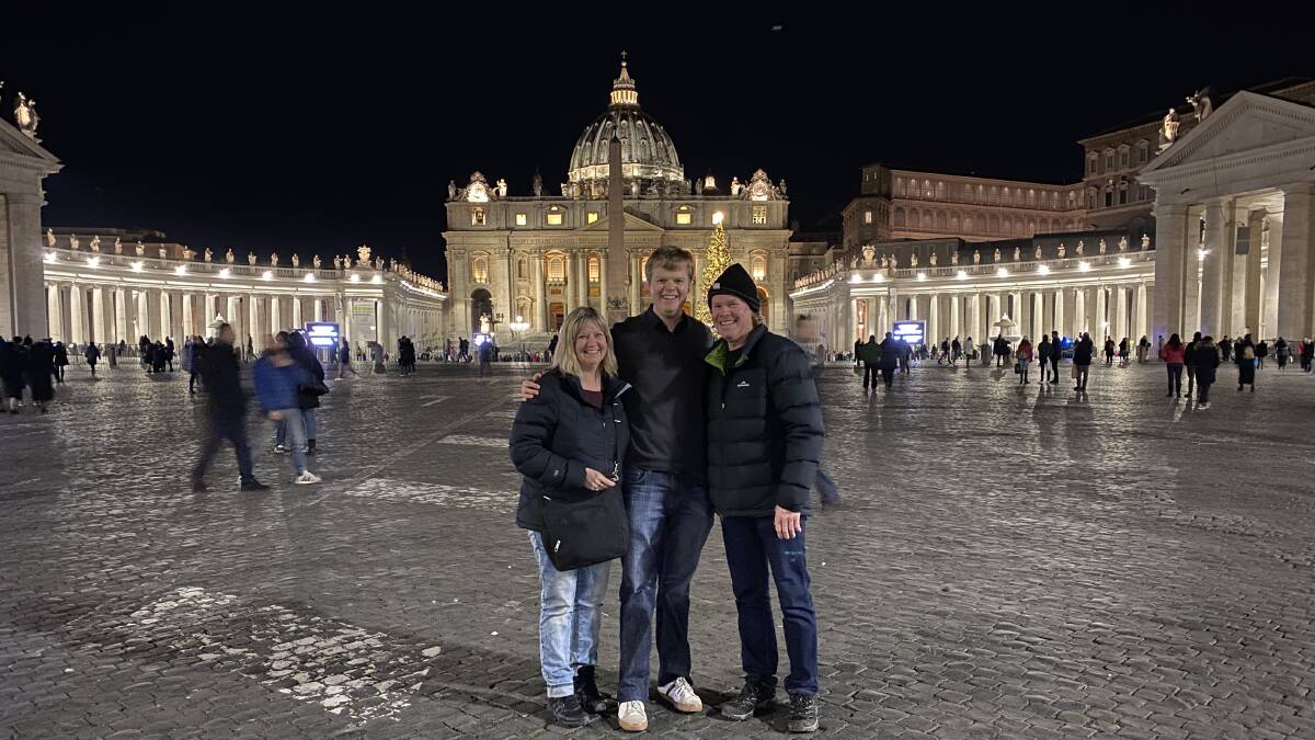 Jackson Saunders (middle) with his parents Sharon and Damien Saunders at Christmas in front of St Peter's Basilica in Rome. Picture: SUPPLIED