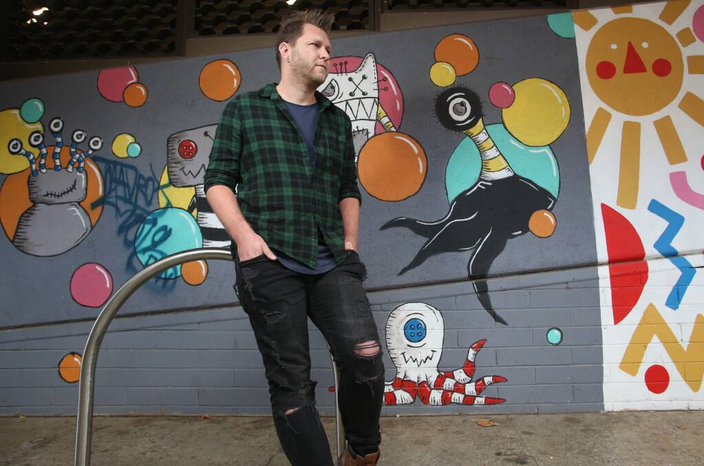 DETERMINED: Nathan Sims (aka Mr Dimples) believes there should be an all-inclusive, ever-changing legal street art wall in Bendigo. Picture: GLENN DANIELS