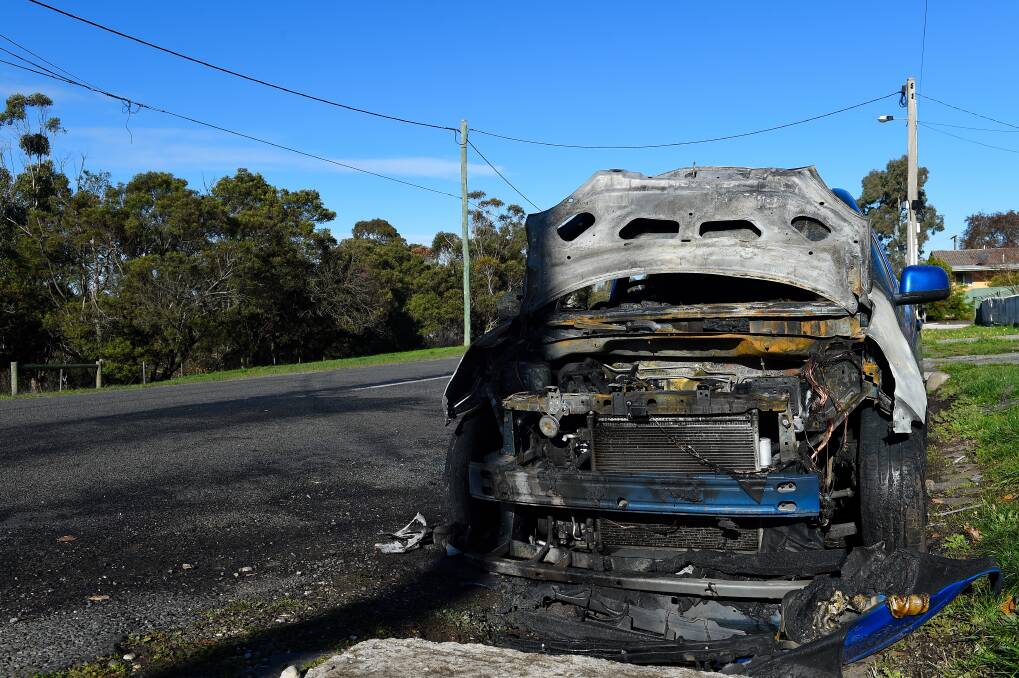 Burnt out: The remains of an 82-year-old woman's car in Redan on Sunday morning. Police are appealing for witnesses. Picture: Adam Trafford