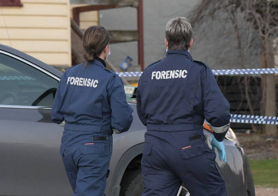 MURDER CHARGE: A Supreme Court jury has begun to hear the closing addresses in the trials of two teenagers accused of murder. Pictured are police officers in Maryborough on July 15, 2018. Picture: NONI HYETT