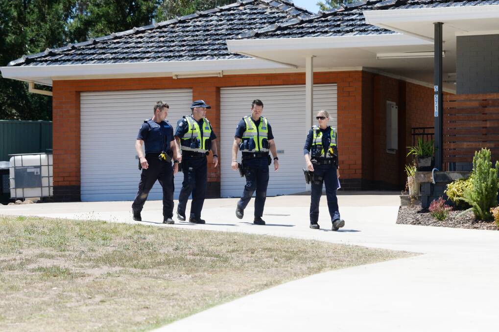 Police in the Kangaroo Flat area as part of a search for Muoi Thai, who fled a house where a significant cannabis-growing operations was discovered on January 7 last year. Picture: DARREN HOWE