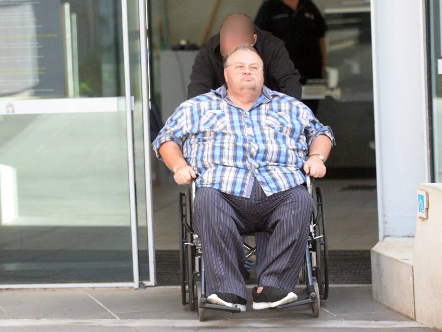 Christopher Ellingburg, accused of collecting money for a fake charity, leaving Bendigo Magistrates' Court earlier this year.