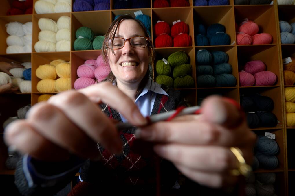 EXCITED: Kai Crosson displaying her crochet skills at the Bendigo Woollen Mills last year. Picture: DARREN HOWE