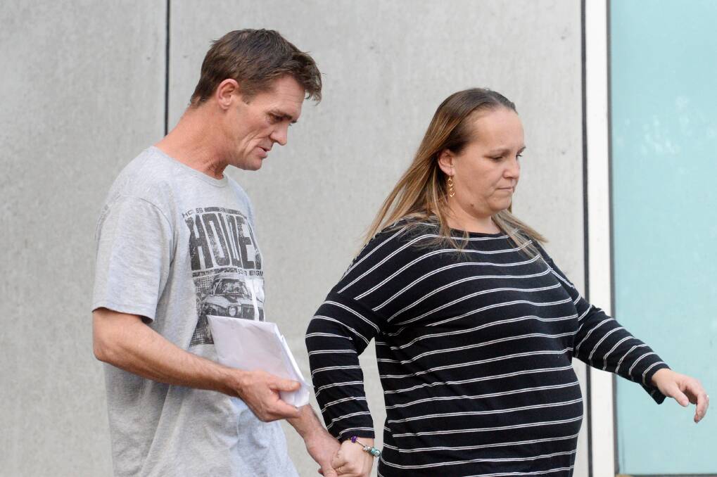 Daniel Simmons leaves Bendigo police station with co-accused Tania Walker, after being granted bail. Picture: DARREN HOWE