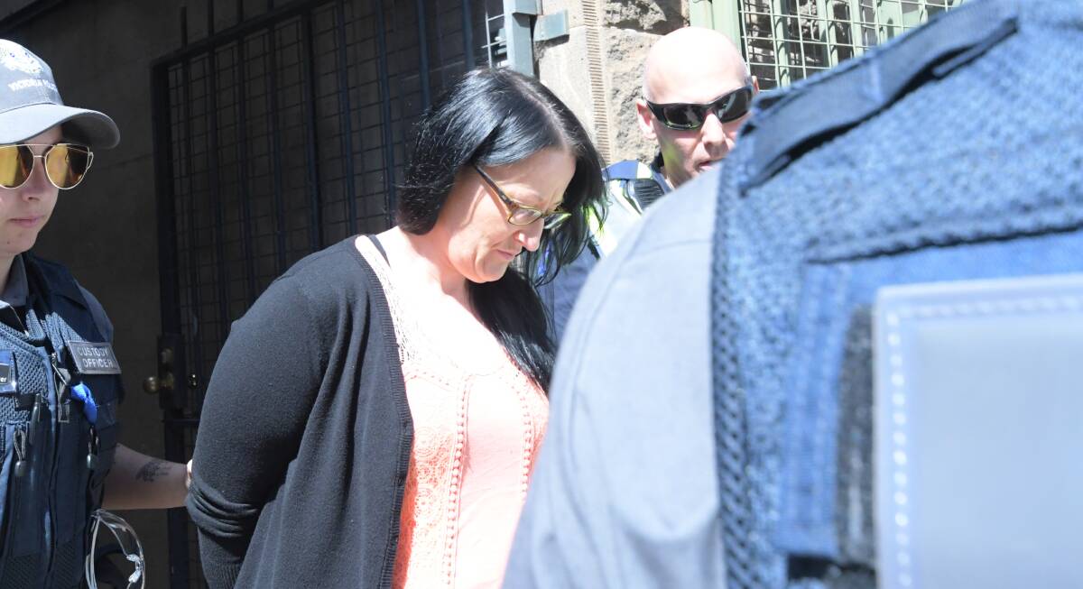 Elise Walker leaving court earlier this year after pleading guilty to manslaughter. She has had her sentence for driving while disqualified cut on appeal. Picture: NONI HYETT
