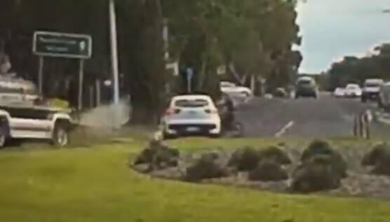 A still from the dashcam video of Sizeland hitting a boy on a bicycle. 